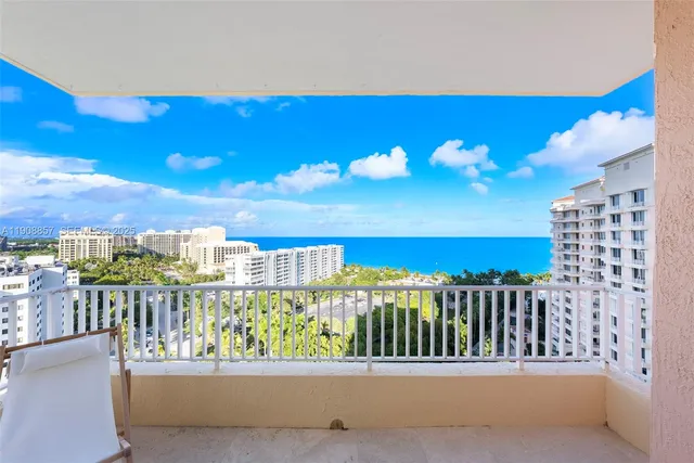 a view of a balcony with city view