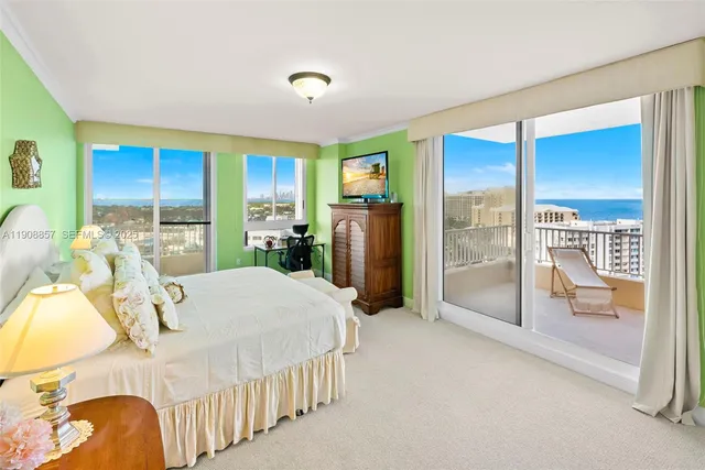 a bed room with a bed and a large window