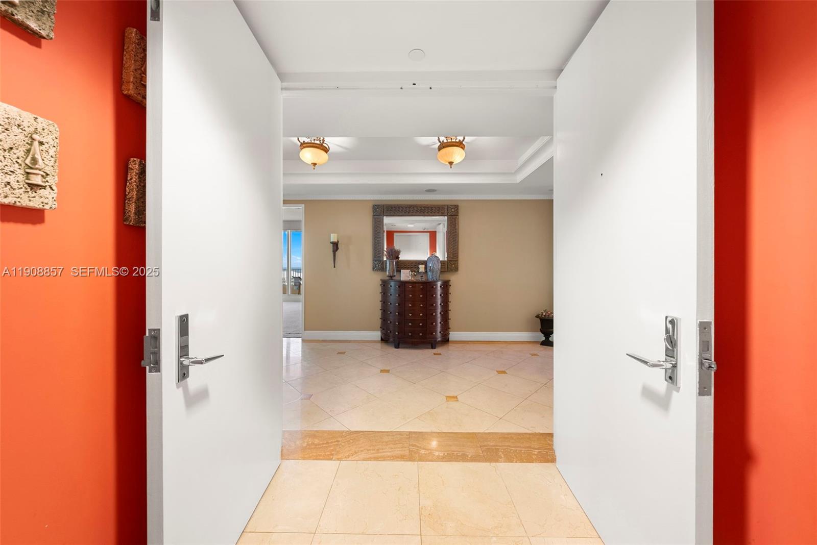 781 Crandon Boulevard, Unit 1406 Key Biscayne, FL 33149 - Photo 3 of 47 a view of a hallway view with wooden floor and windows