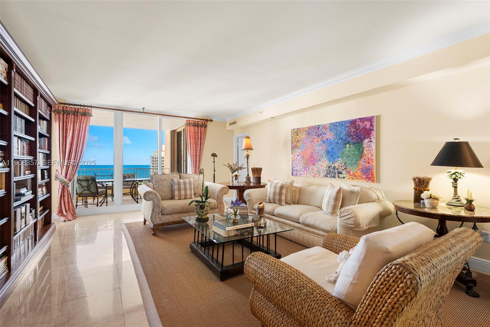781 Crandon Boulevard, Unit 1406 Key Biscayne, FL 33149 - Photo 5 of 47 a living room with furniture and a large window