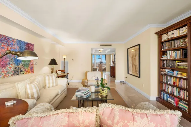 a bedroom with a bed and a book shelf