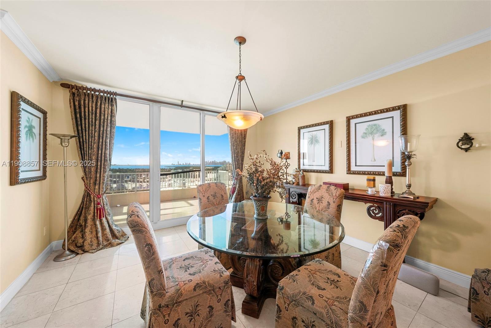 781 Crandon Boulevard, Unit 1406 Key Biscayne, FL 33149 - Photo 7 of 47 a view of a dining room with furniture