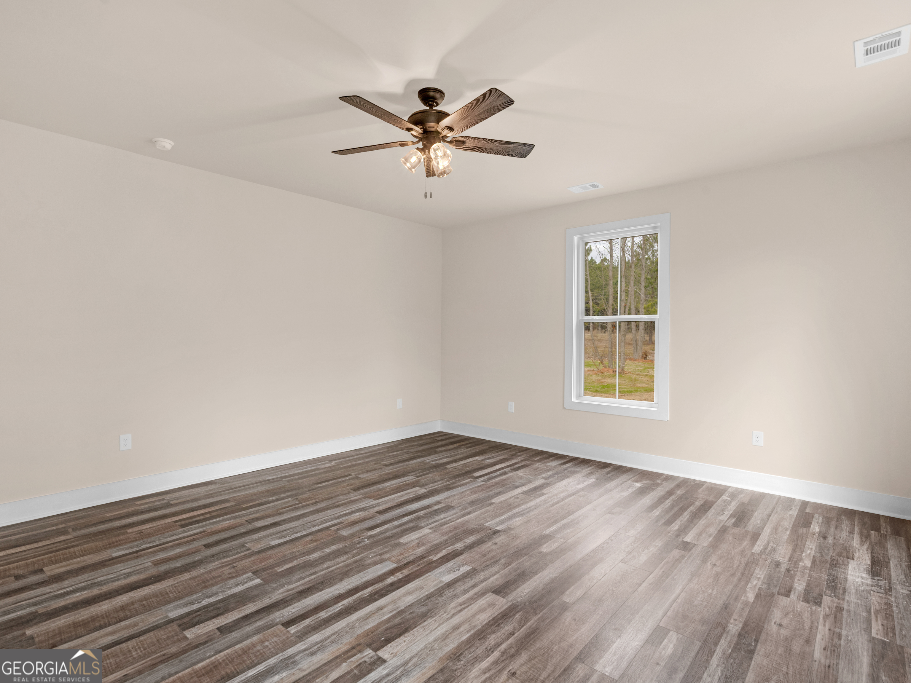160 Loyd Road Mansfield, GA 30056 - Photo 42 of 53 wooden floor in an empty room with a window