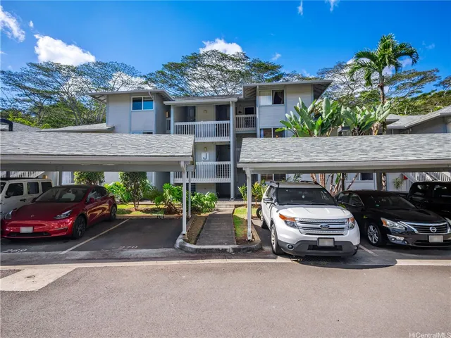 a car parked in front of a house