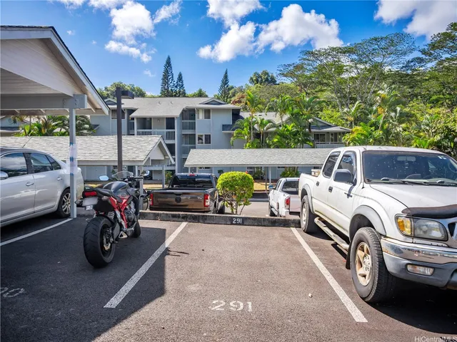 a view of a car in front of house