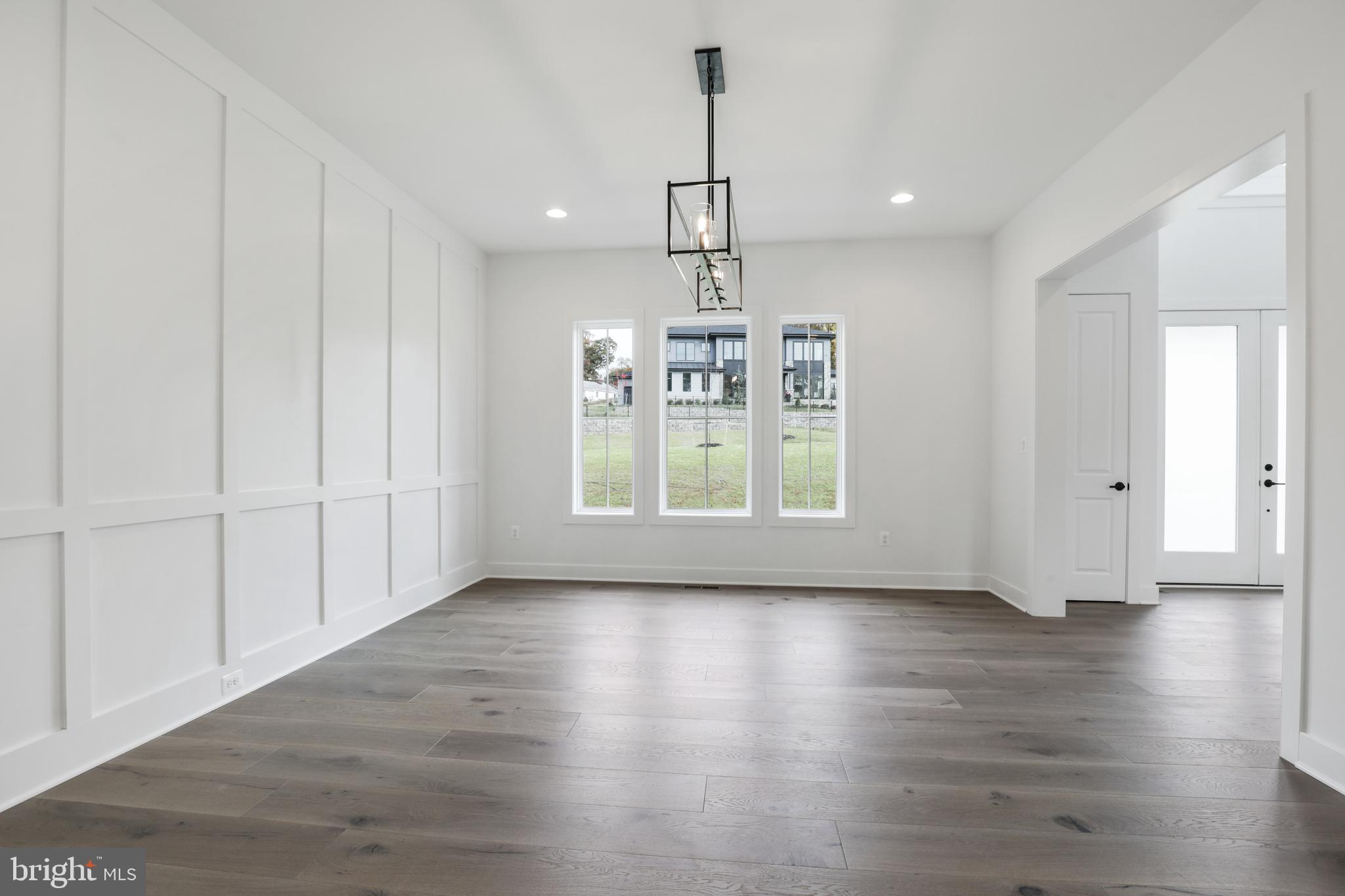 12712 High Meadow Road North Potomac, MD 20878 - Photo 5 of 14 a view of an empty room with wooden floor and a window