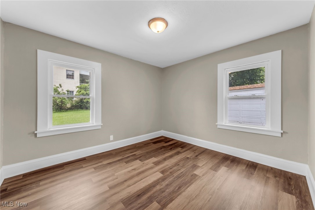 3528 Daleford Road Cleveland, OH 44120 - Photo 21 of 30 Unfurnished room featuring wood finished floors and baseboards