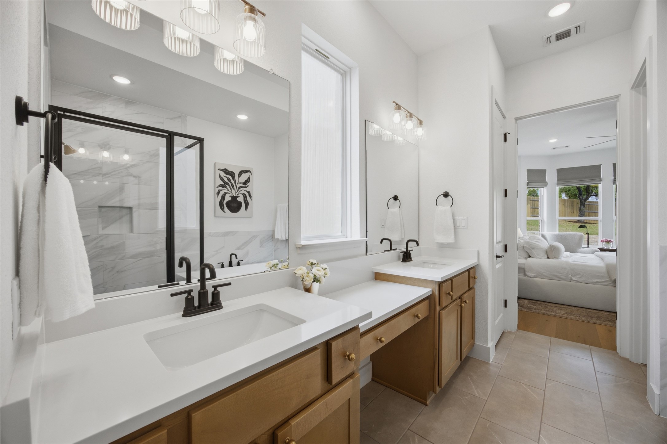 1217 Calendula Trail Georgetown, TX 78628 - Photo 12 of 39 Ensuite bathroom featuring double vanity, a marble finish shower, recessed lighting, and light tile patterned flooring
