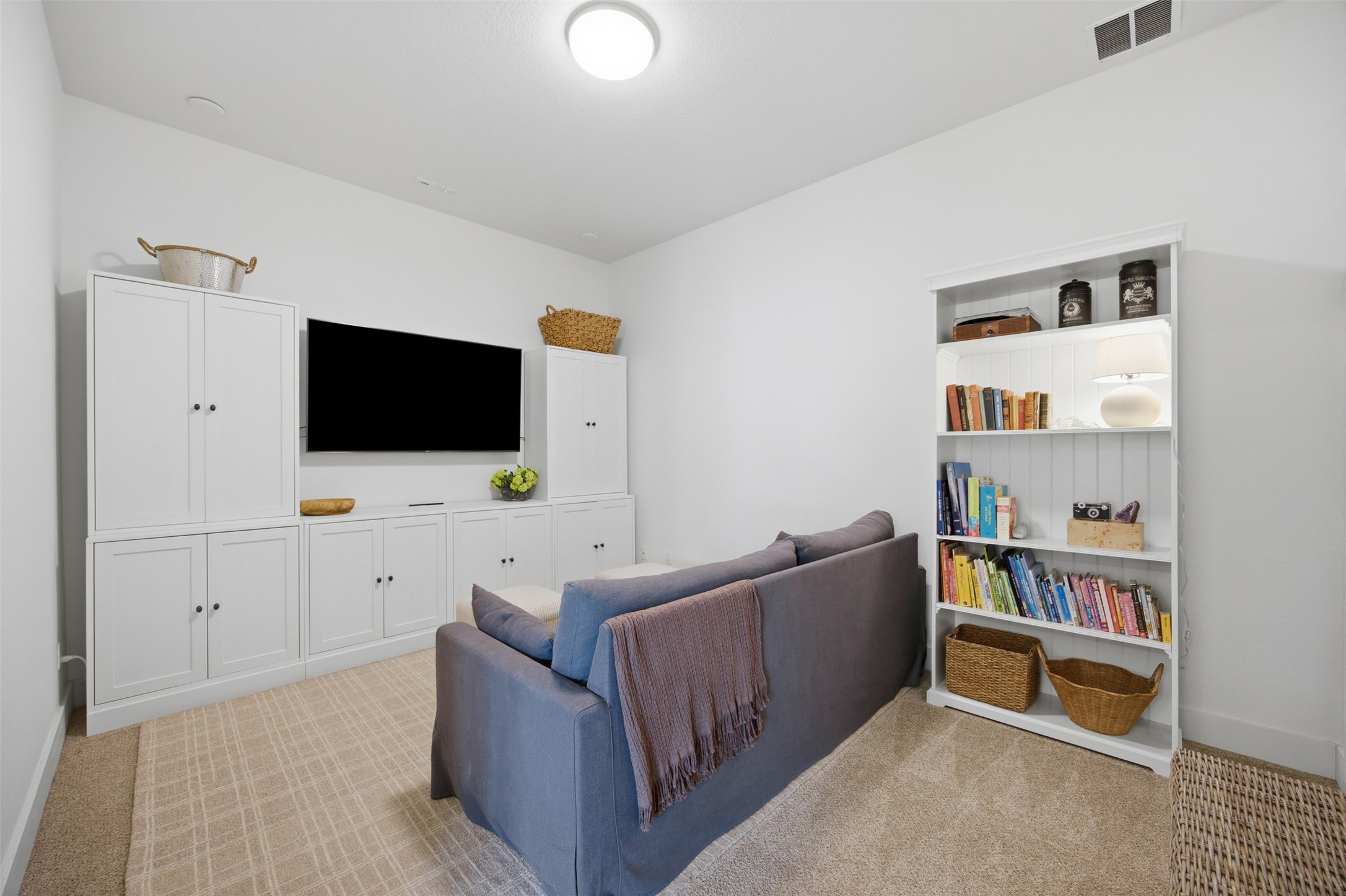 1217 Calendula Trail Georgetown, TX 78628 - Photo 21 of 39 Living room featuring light colored carpet