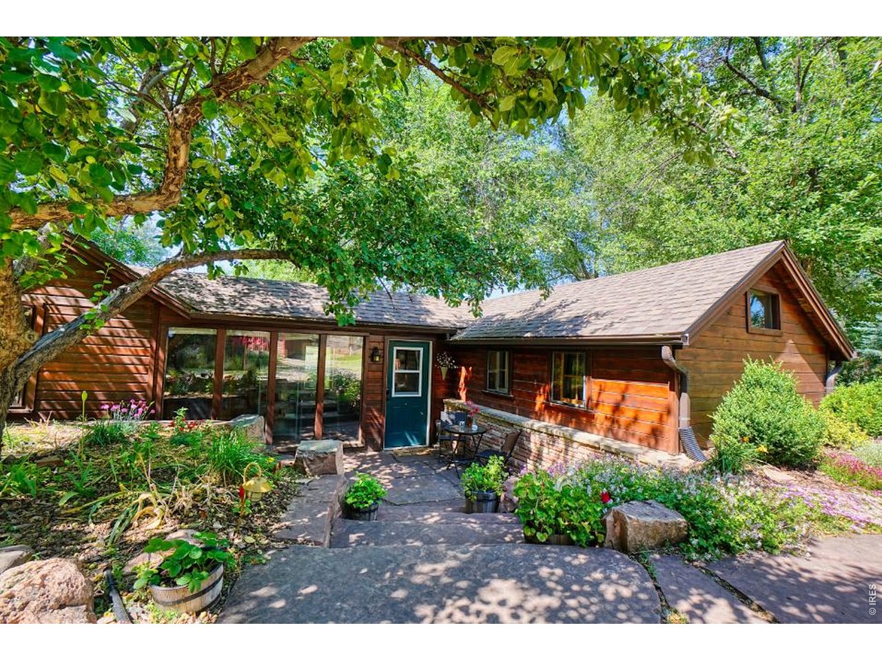 11 Red Gulch Road Lyons, CO 80540 - Photo 2 of 47 Inviting entry with garden beds