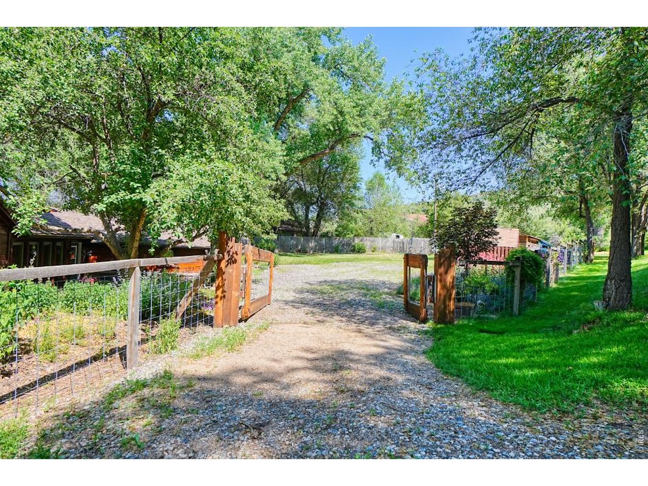 11 Red Gulch Road Lyons, CO 80540 - Photo 31 of 47 Custom artistic fence and plenty of parking