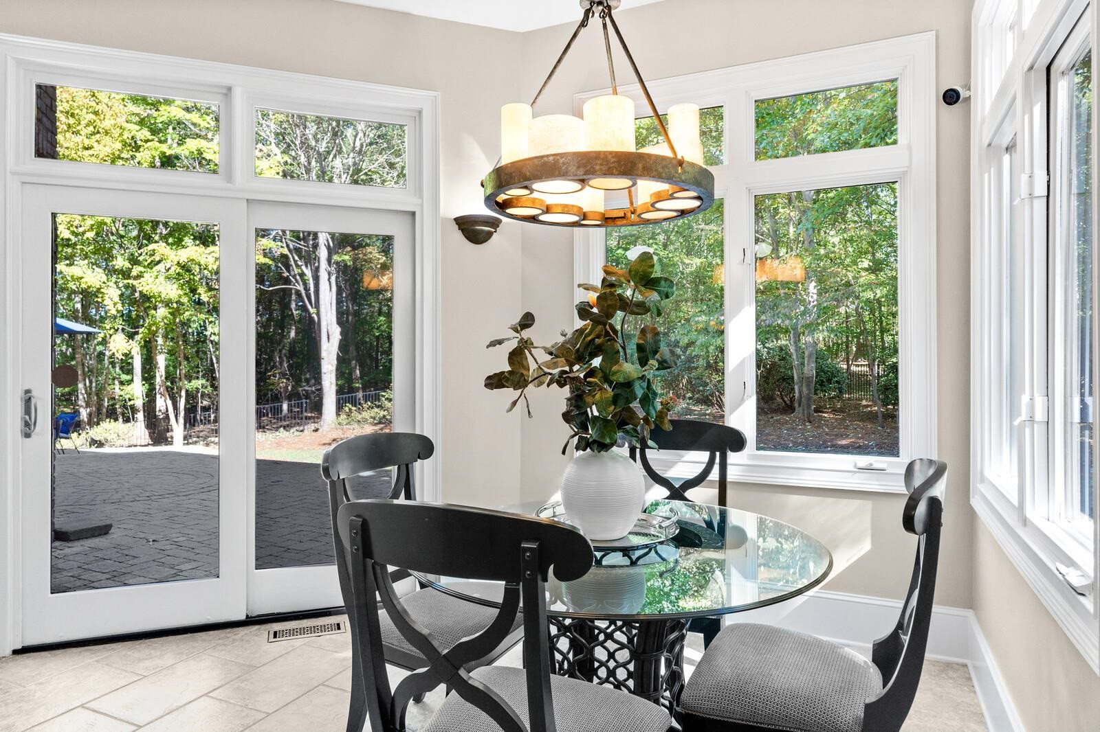 6620 Rest Haven Drive Raleigh, NC 27612 - Photo 12 of 52 Doors lead out to stone patio