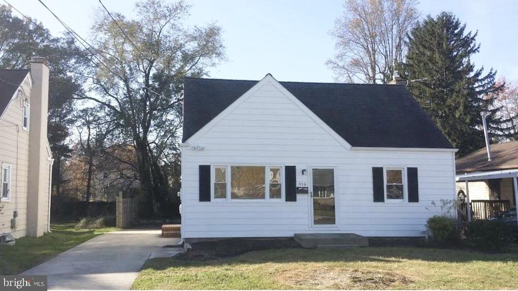 316 Franklin Road Glassboro, NJ 08028 - Photo 1 of 16 a front view of house with yard