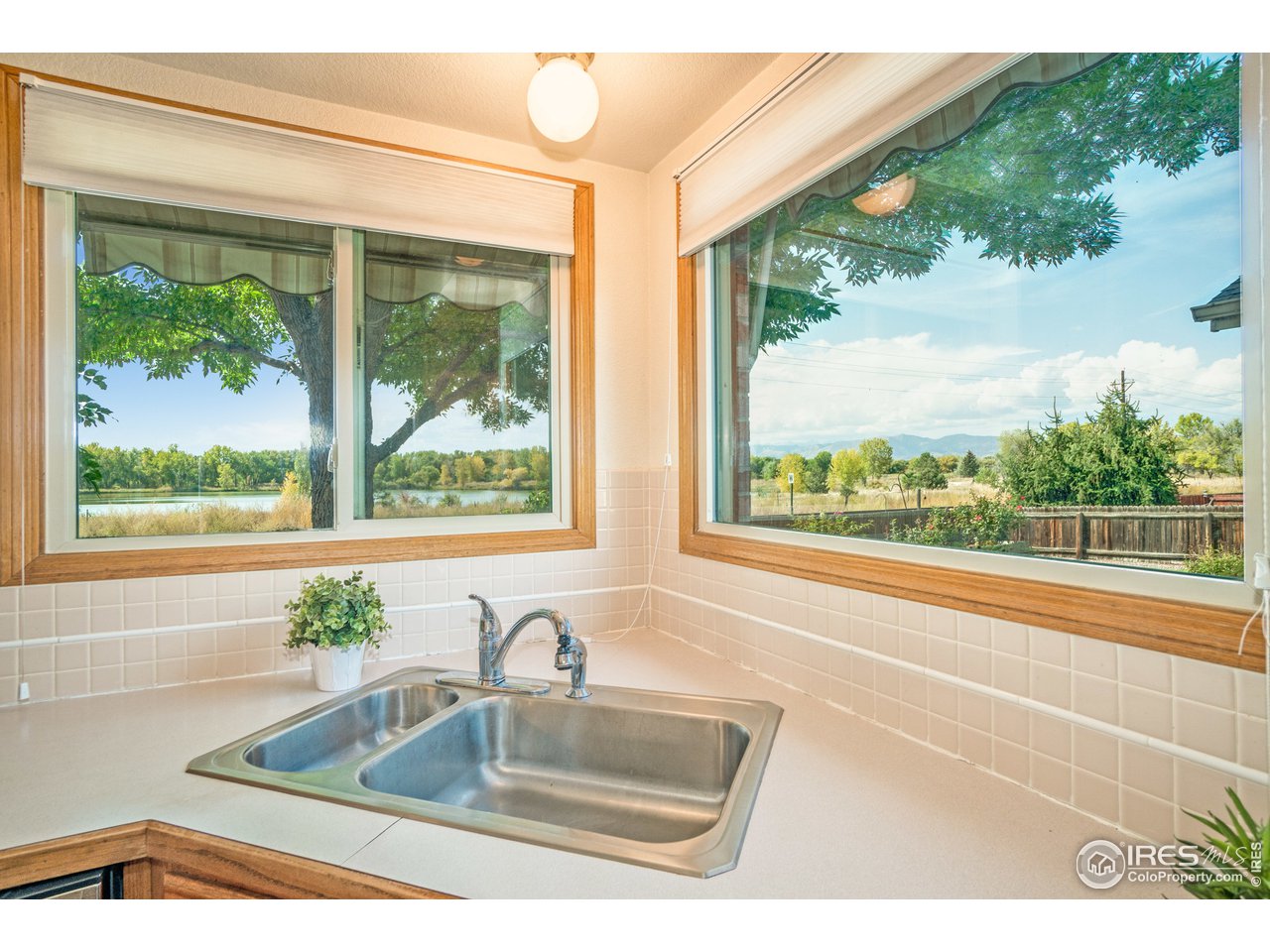 757 Wade Road Longmont, CO 80503 - Photo 8 of 36 Views of Mountains & Ponds