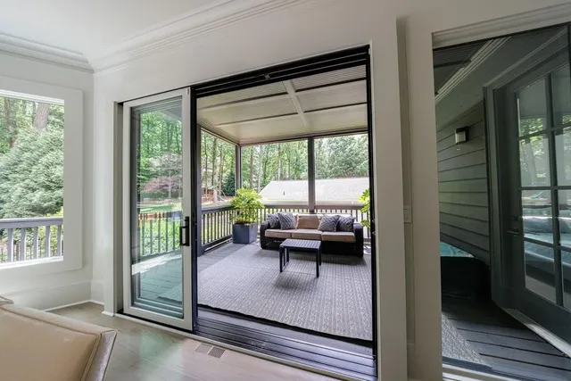 a view of living room with furniture and a flat screen tv
