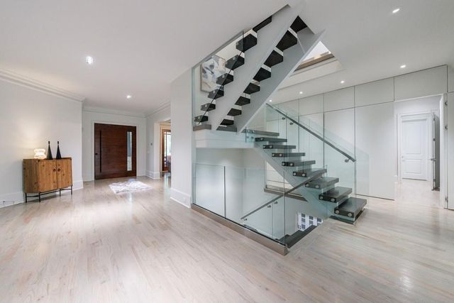 a view of living room with furniture and a flat screen tv