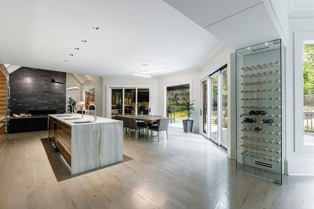 a kitchen with stainless steel appliances granite countertop a stove and a refrigerator