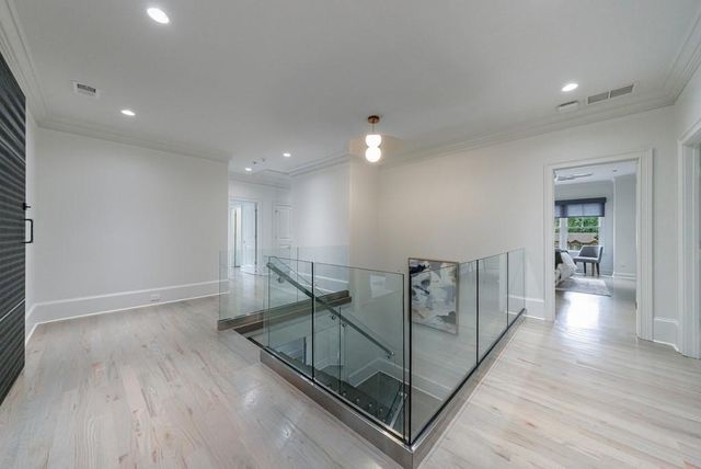 a bathroom with double sink and a mirror