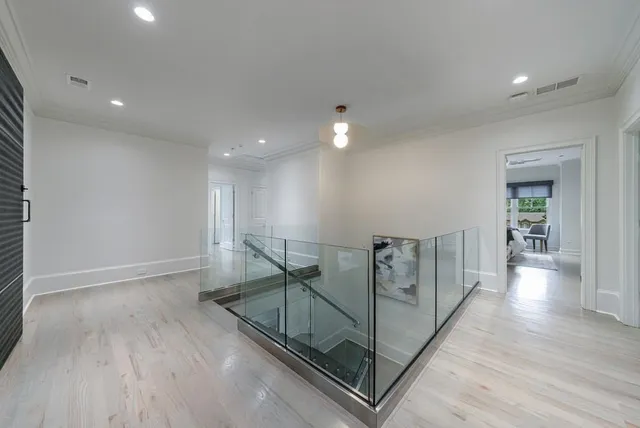 a bathroom with double sink and a mirror