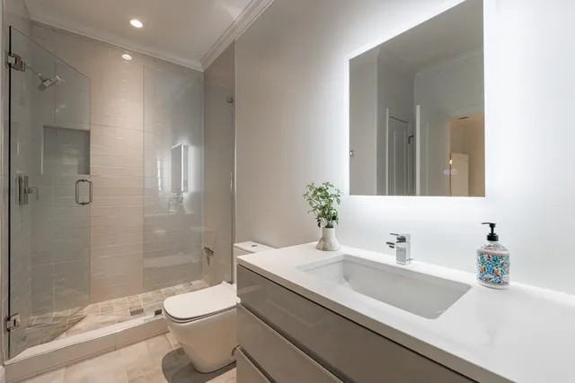 a view of a chair and table in the garden