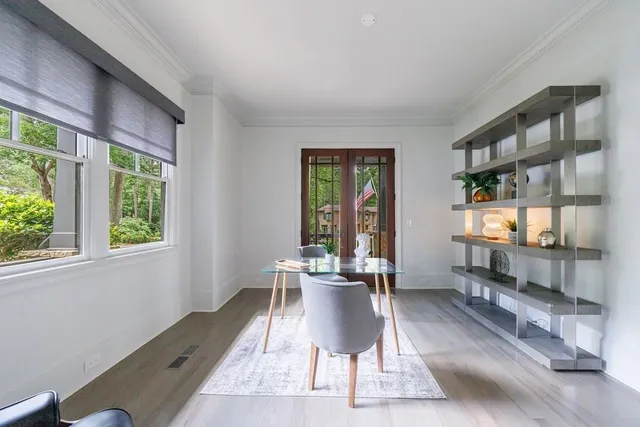 a view of a dining room with furniture window and outside view