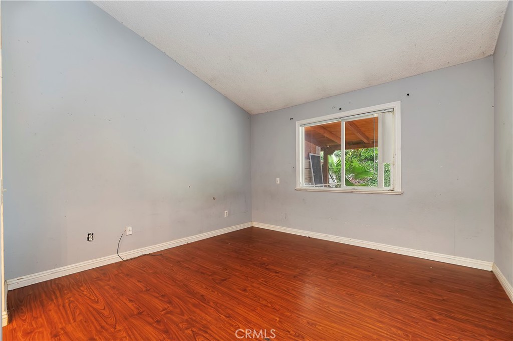 1959 Thornton Street Riverside, CA 92507 - Photo 15 of 26 wooden floor in an empty room