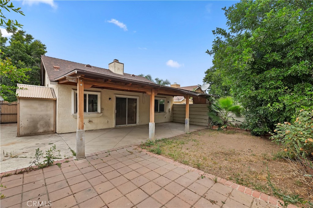 1959 Thornton Street Riverside, CA 92507 - Photo 25 of 26 a front view of a house with a yard