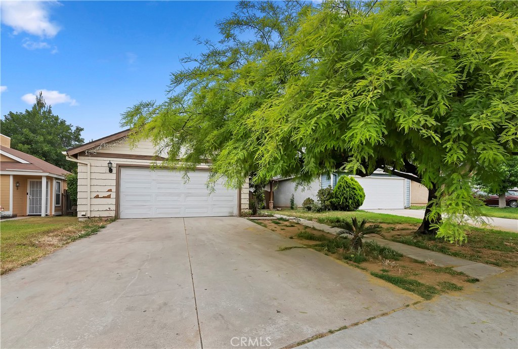 1959 Thornton Street Riverside, CA 92507 - Photo 3 of 26 front view of a house with a street