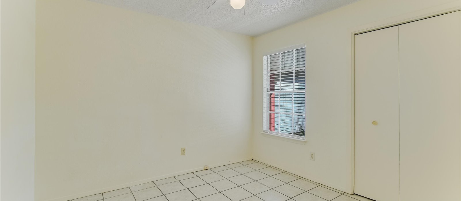 3908 Holt Drive Austin, TX 78749 - Photo 15 of 21 a view of an empty room with windows