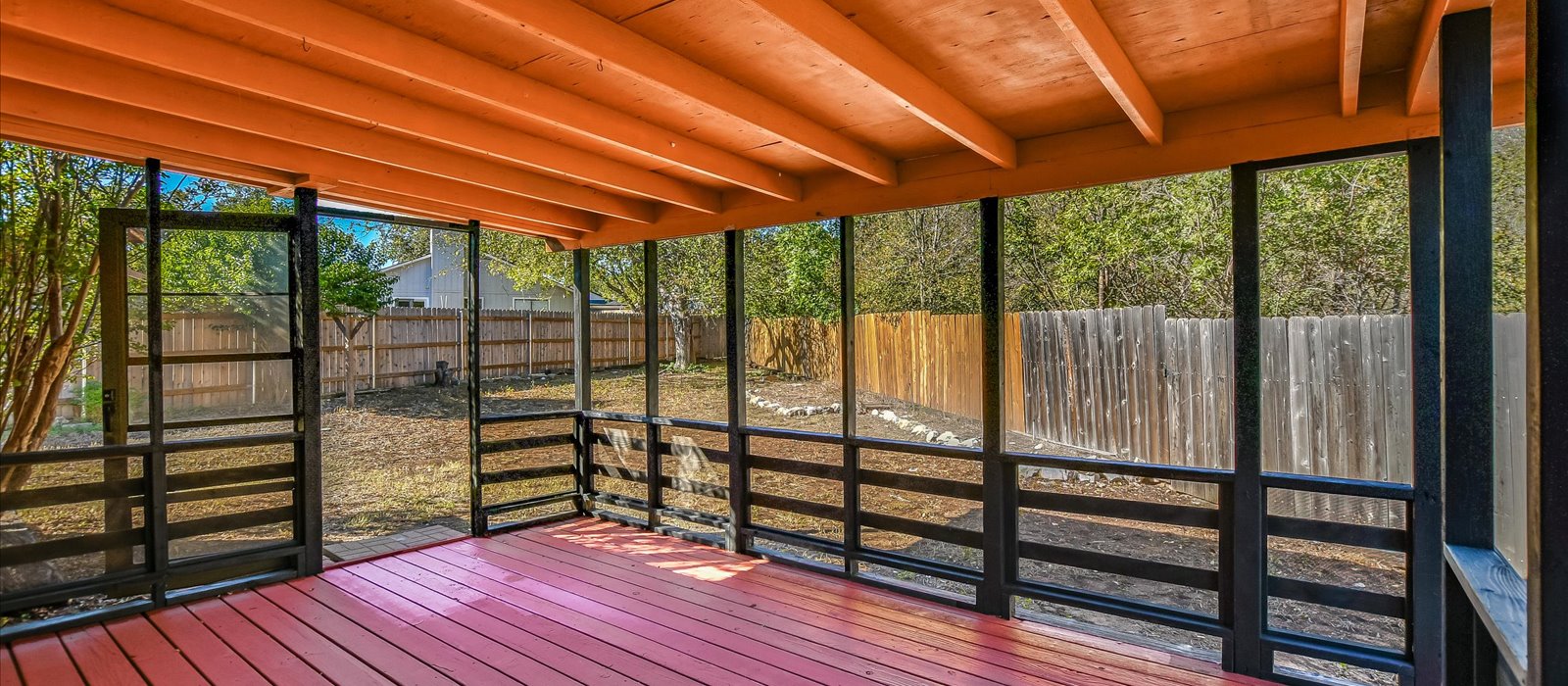 3908 Holt Drive Austin, TX 78749 - Photo 17 of 21 a view of outdoor space with deck and wooden floor