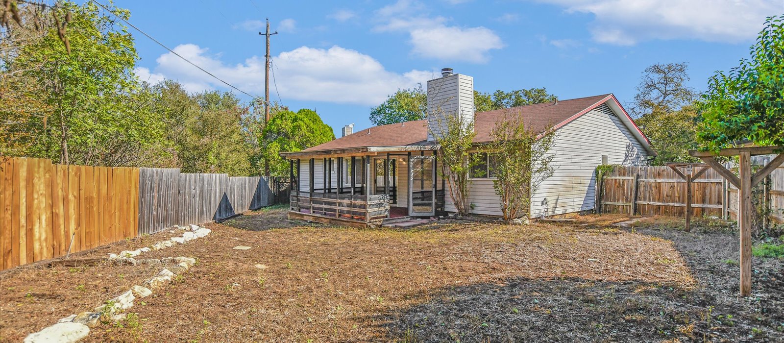3908 Holt Drive Austin, TX 78749 - Photo 19 of 21 a view of a house with backyard and sitting area