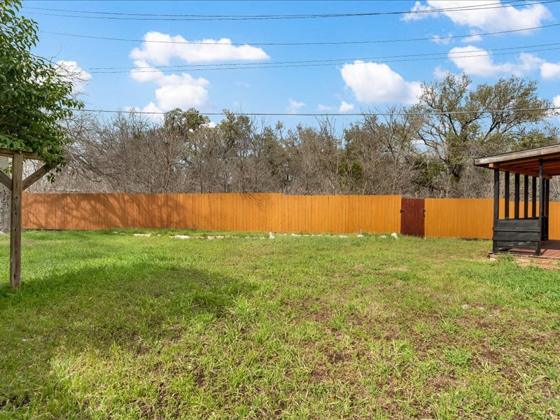 3908 Holt Drive Austin, TX 78749 - Photo 24 of 24 a view of yard with swimming pool and green space