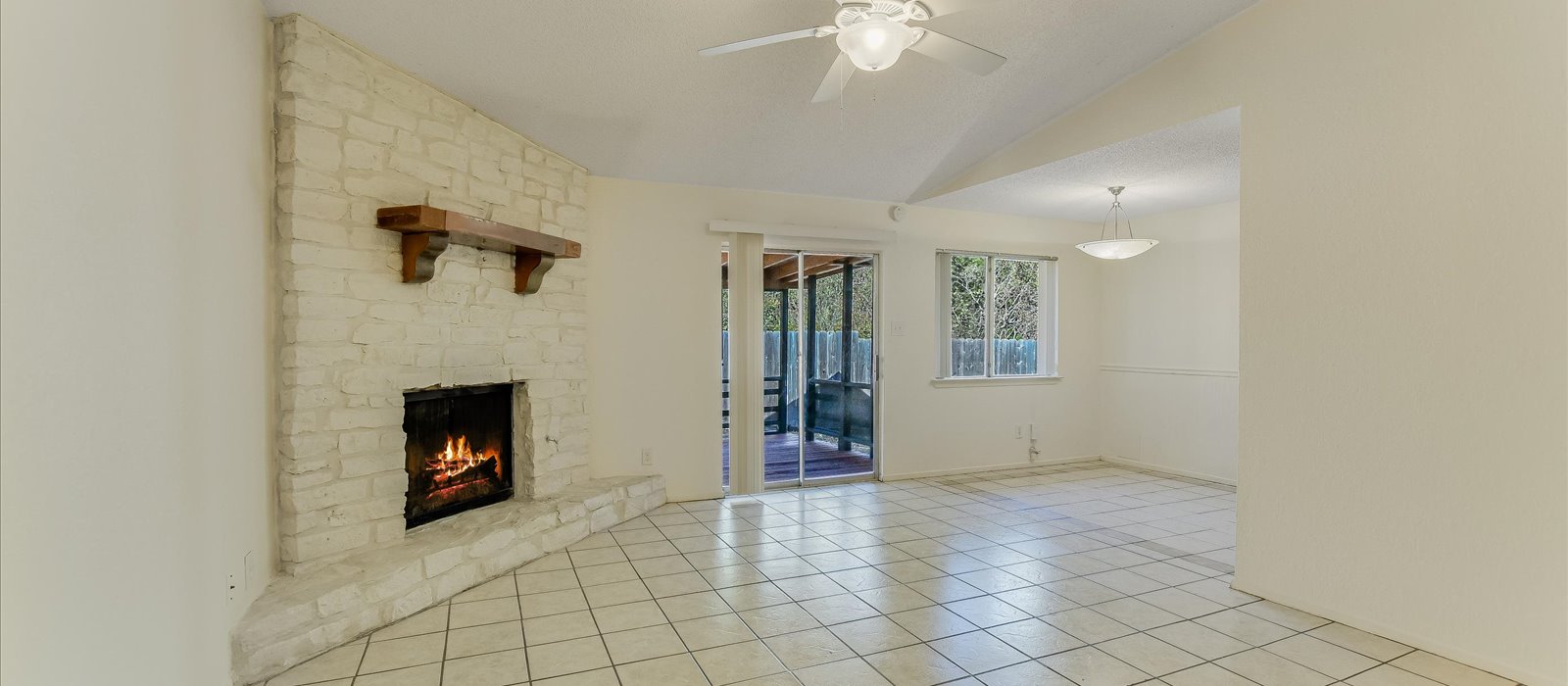 3908 Holt Drive Austin, TX 78749 - Photo 5 of 21 a view of an empty room with a fireplace