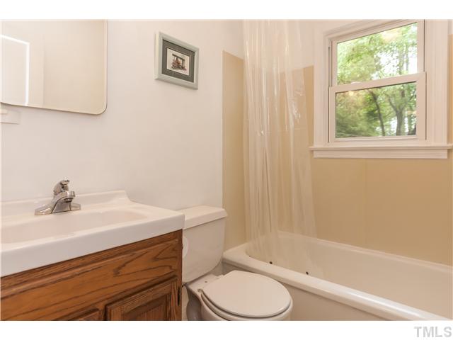 702 Van Buren Road Raleigh, NC 27604 - Photo 15 of 18 Second full bath, also with vanity and medicine cabinet storage.