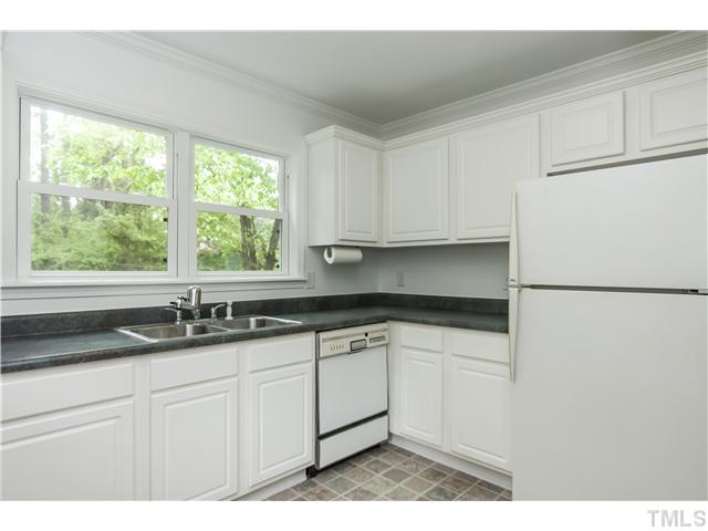 702 Van Buren Road Raleigh, NC 27604 - Photo 6 of 18 Fabulous updated kitchen with lovely view of the rear yard.