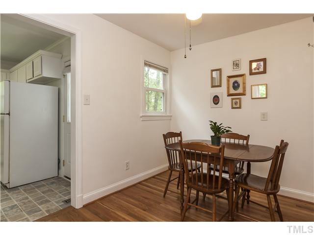 702 Van Buren Road Raleigh, NC 27604 - Photo 10 of 18 The dining room opens to the kitchen for easy traffic flow.