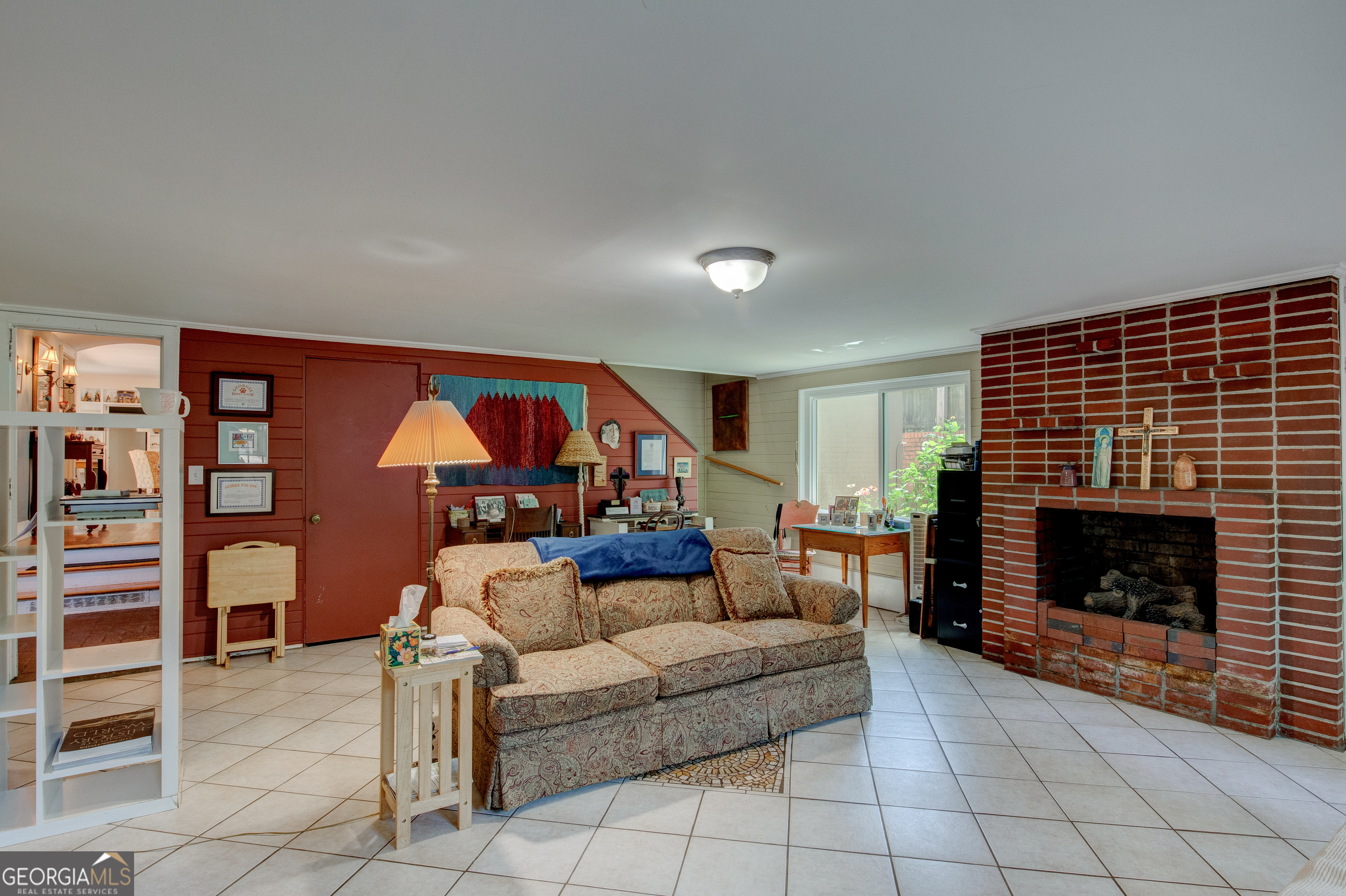 31 Notasulga Drive Rome, GA 30161 - Photo 17 of 38 a living room with furniture a fireplace and a large window