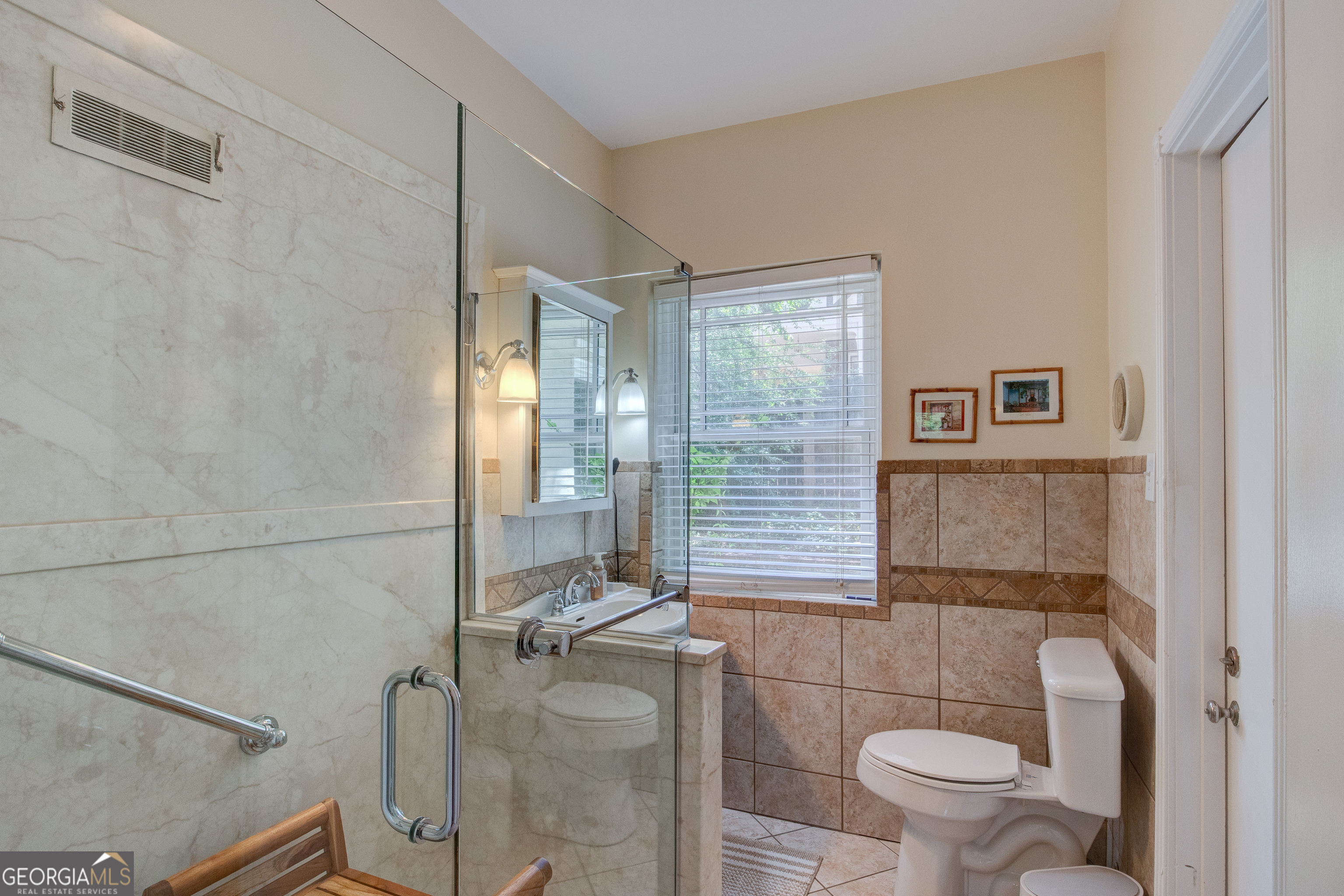31 Notasulga Drive Rome, GA 30161 - Photo 23 of 38 a bathroom with a toilet and a shower