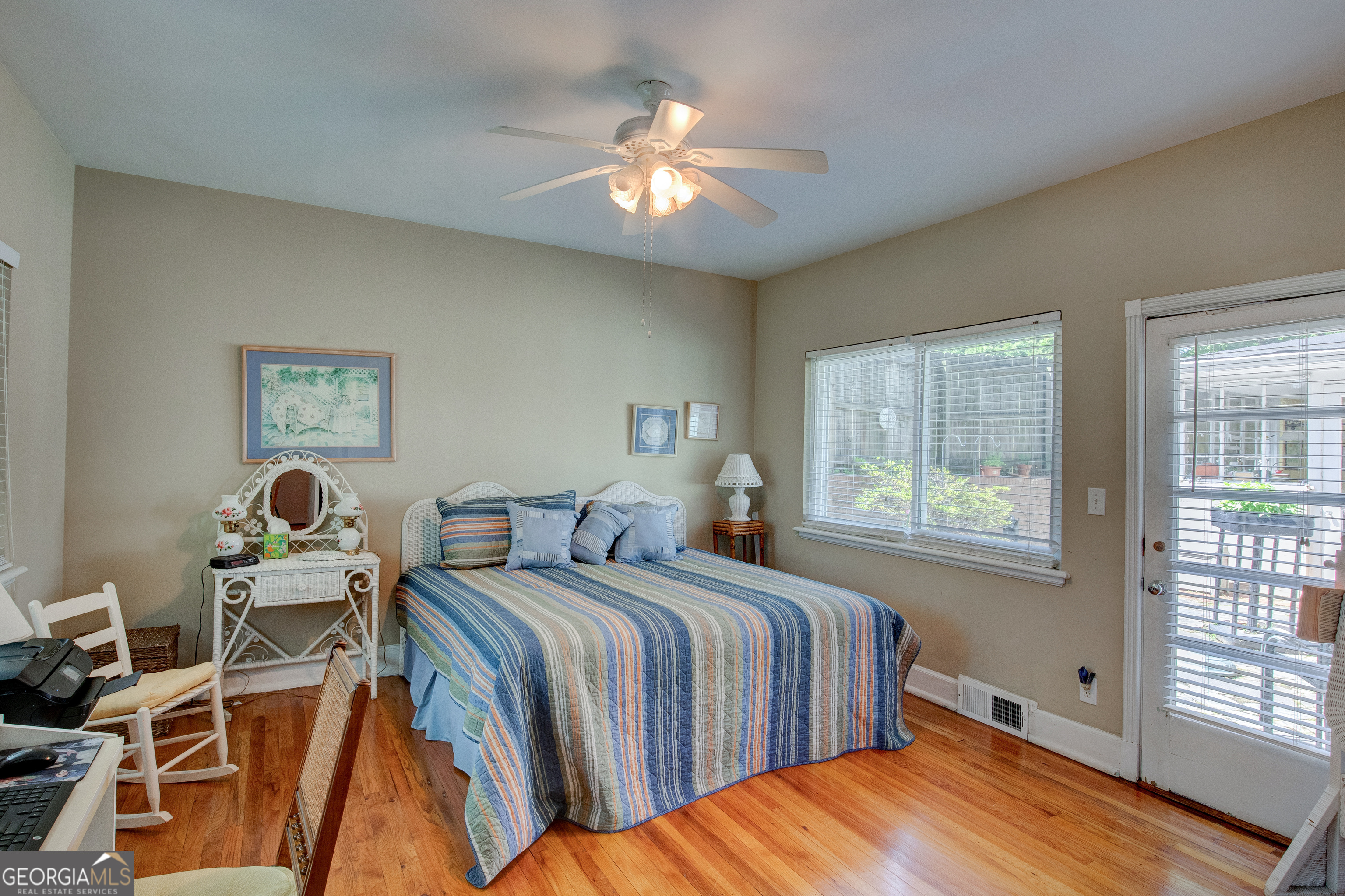 31 Notasulga Drive Rome, GA 30161 - Photo 24 of 38 a bedroom with two beds and a chandelier