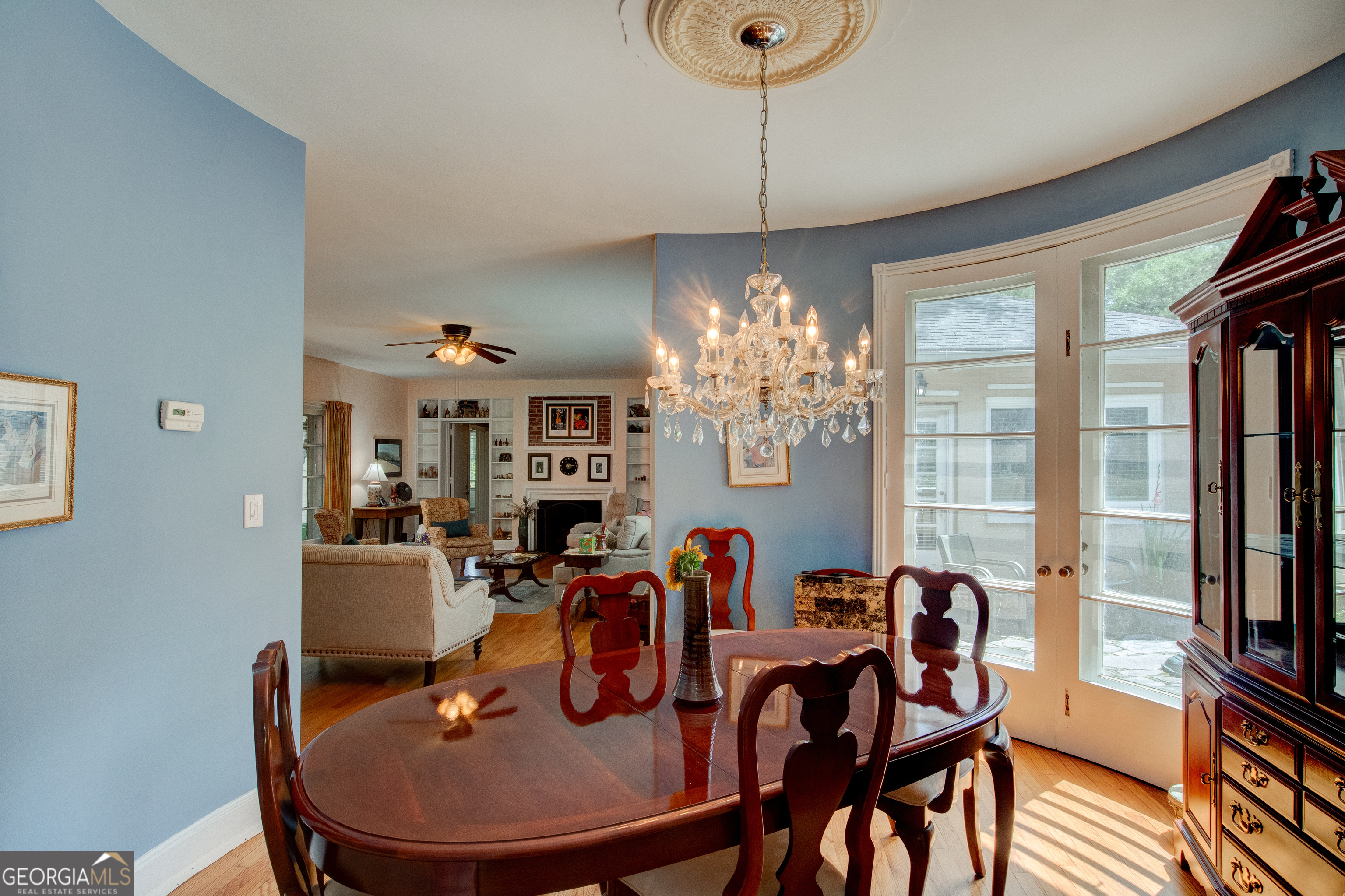 31 Notasulga Drive Rome, GA 30161 - Photo 10 of 38 a view of a dining room with furniture a chandelier and wooden floor