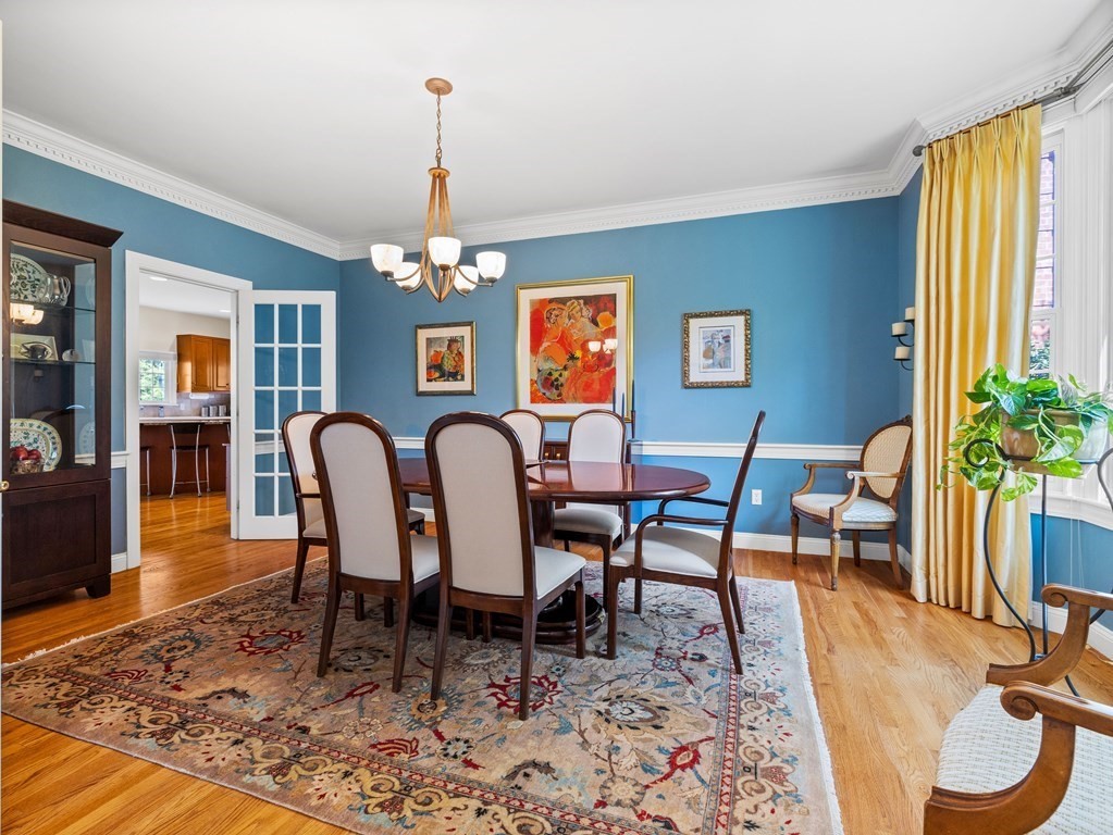 14 Moccasin Path Natick, MA 01760 - Photo 14 of 34 a view of a a dining room with furniture window and wooden floor