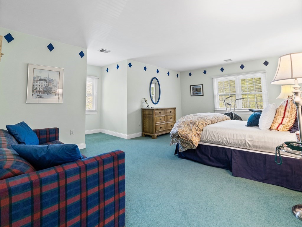 14 Moccasin Path Natick, MA 01760 - Photo 22 of 34 a bedroom with a bed and window