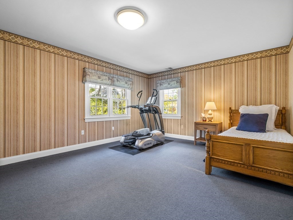 14 Moccasin Path Natick, MA 01760 - Photo 23 of 34 a living room with furniture and a window