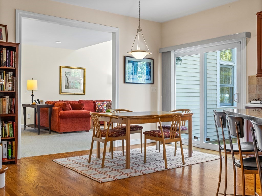 14 Moccasin Path Natick, MA 01760 - Photo 8 of 34 a living room with furniture and a wooden floor