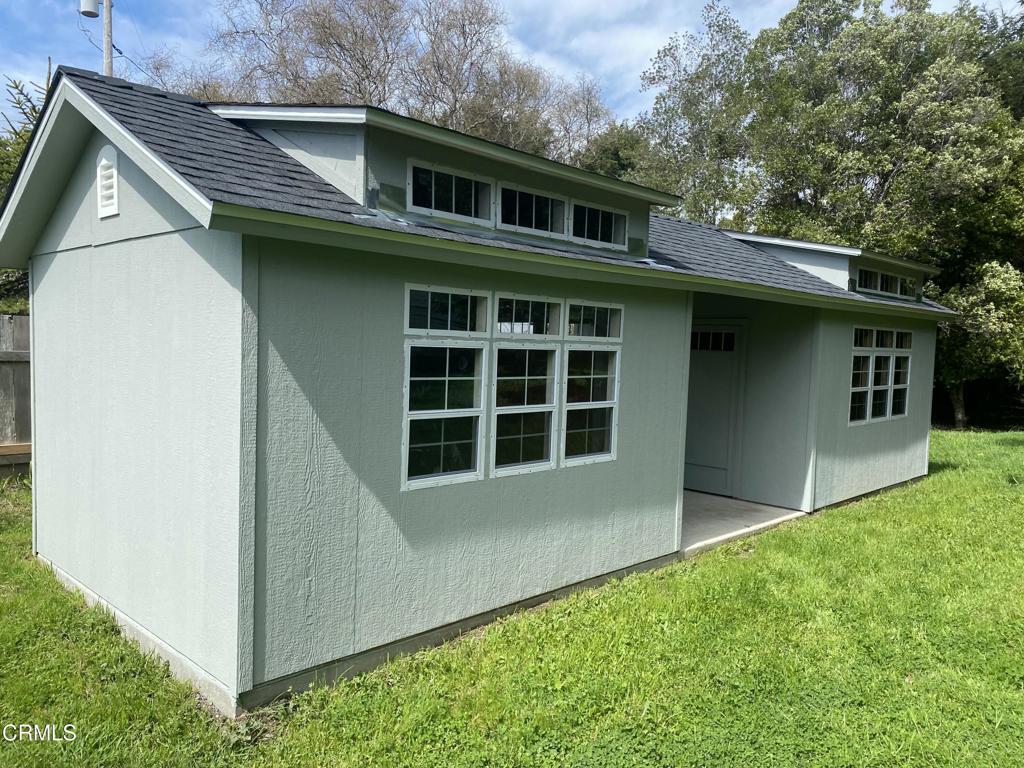 31400 Sherwood Road Fort Bragg, CA 95437 - Photo 48 of 55 a front view of a house with a garden