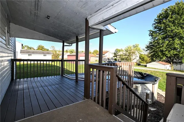 a view of deck with wooden floor and outdoor seating