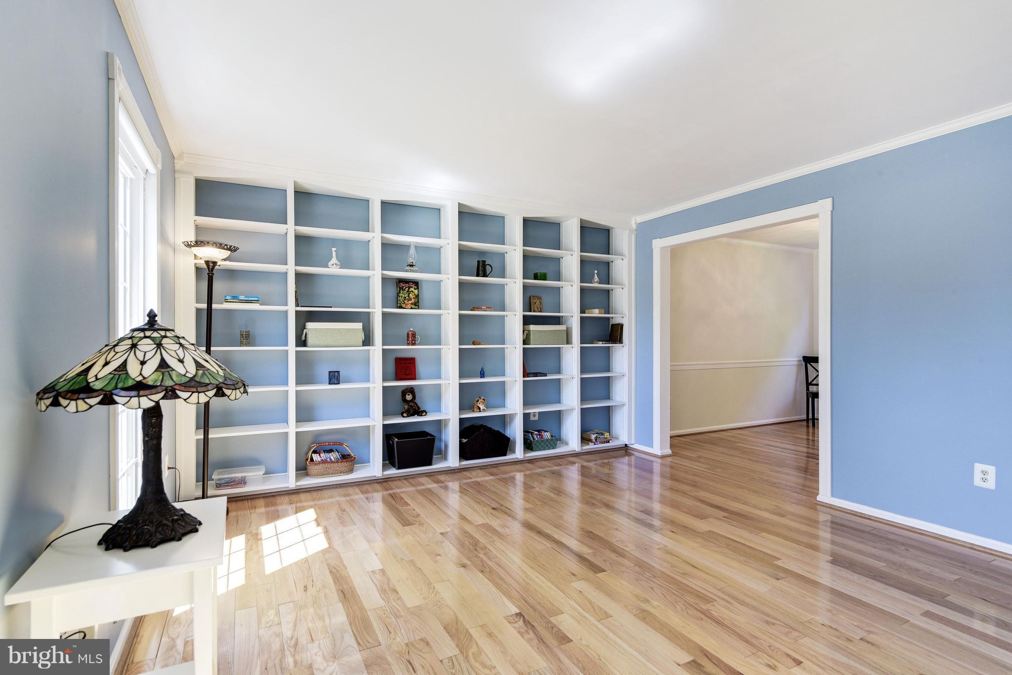 905 Pointer Ridge Drive Gaithersburg, MD 20878 - Photo 5 of 30 a view of empty room with wooden floor and windows