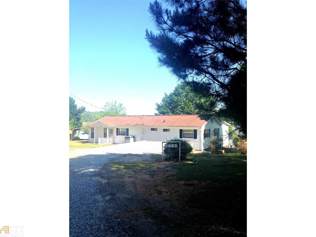 212 Roberts Point Road, Unit A Jackson, GA 30233 - Photo 1 of 1 a view of a house with a yard