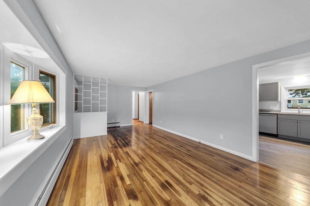 99 Bacon Road Springfield, MA 01119 - Photo 8 of 28 a view of a room with wooden floor and a window