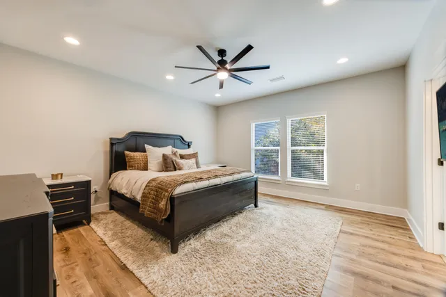 a bathroom with a tub and a shower